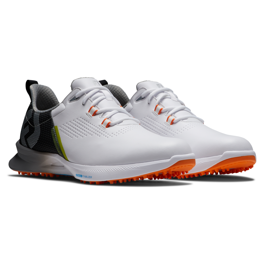 Golf shoes with a green design on the back, white front, and orange accents.